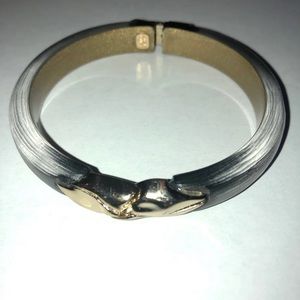 Alexis Bittar metal hinge lucite bracelet.